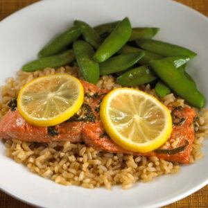 Citrus Ginger Honey Glazed Salmon with Whole Grain Rice and Sugar Snap Peas